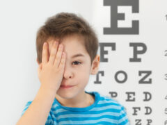 Little boy having eye test at ophthalmologist office