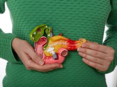 Woman suffering from pain in pancreas area and gallbladder. Treatment of pancreatic diseases, acute and chronic pancreatitis